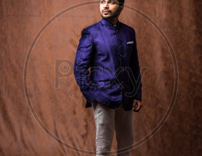 Male wears Coat / Sherwani, traditional Indian dress for wedding or festival