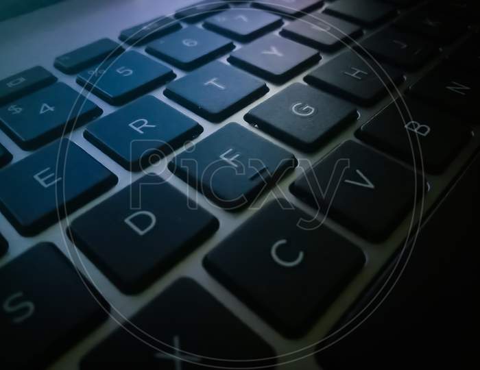 key board image with dark shadow with some selective focus