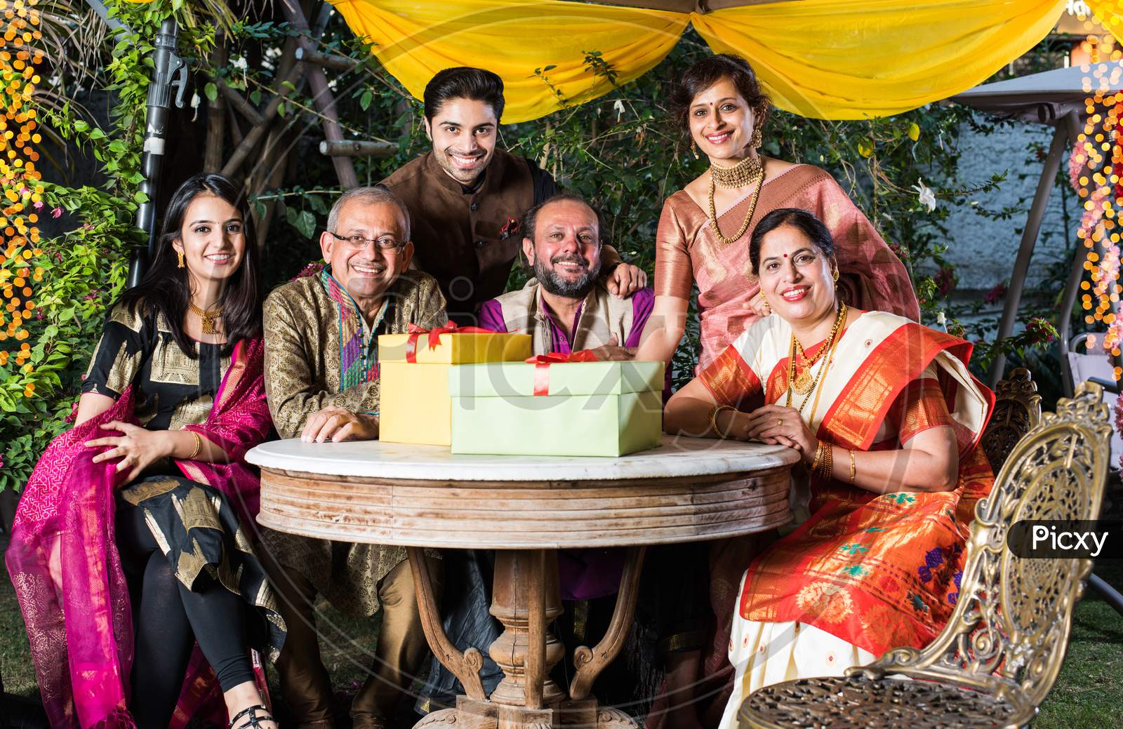 Group photo of indian family while celebrating festival
