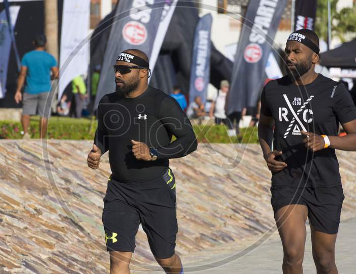 Muscat, Oman 17th july 2020. Sportsmen and women performing various hurdles and adventure sports in the spartan race of middle east.