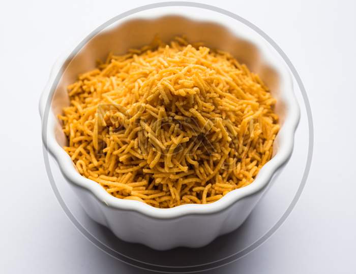 Aloo Bhujiya or Potato Bhujia also known as Namkeen sev. Popular Bikaneri recipe served in a bowl or plate. selective focus