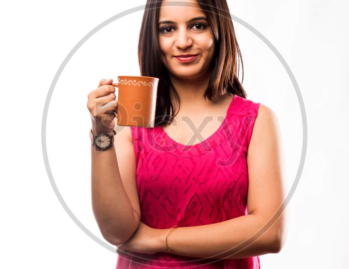 Indian girl drinking Coffee