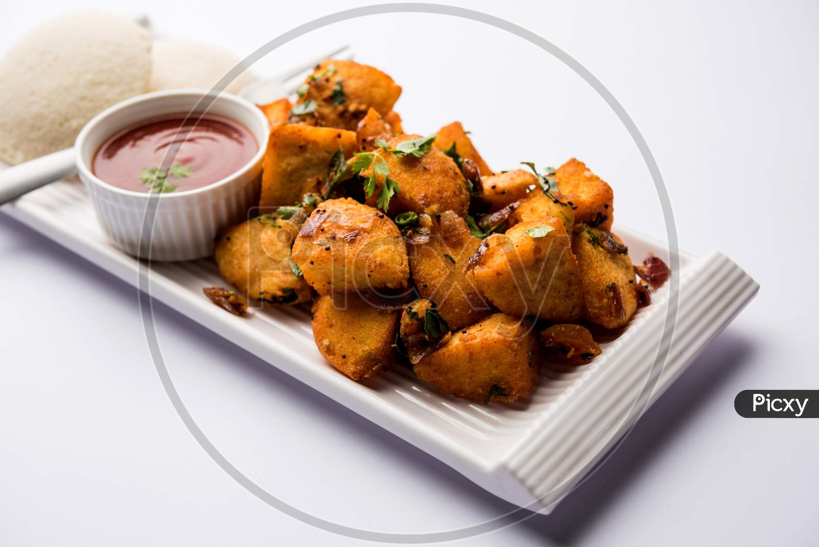 Image of fried masala idli or Masala Idli fry is a popular indian Snack ...