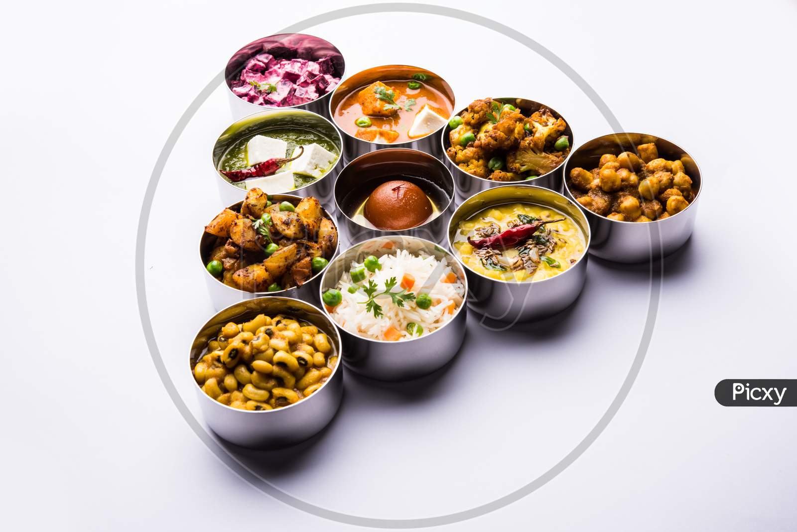 Assorted Indian Food in steel bowls