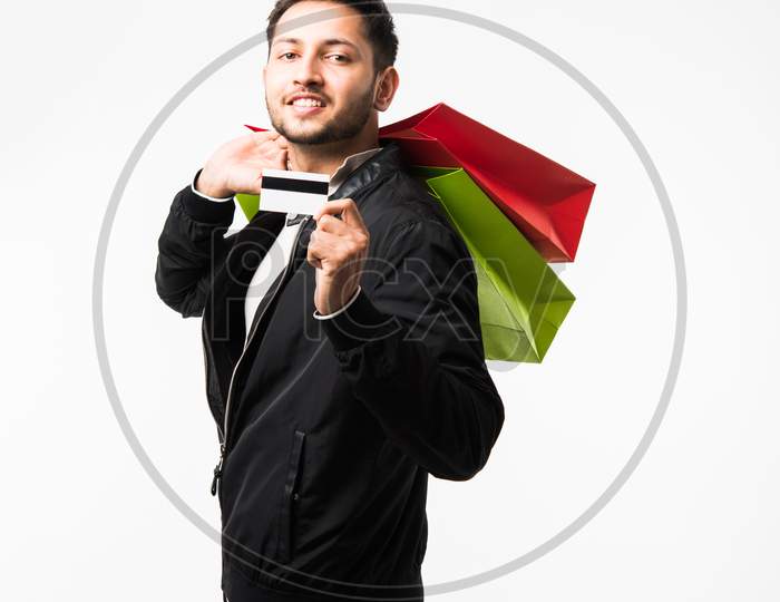 Indian/asian man with shopping bags