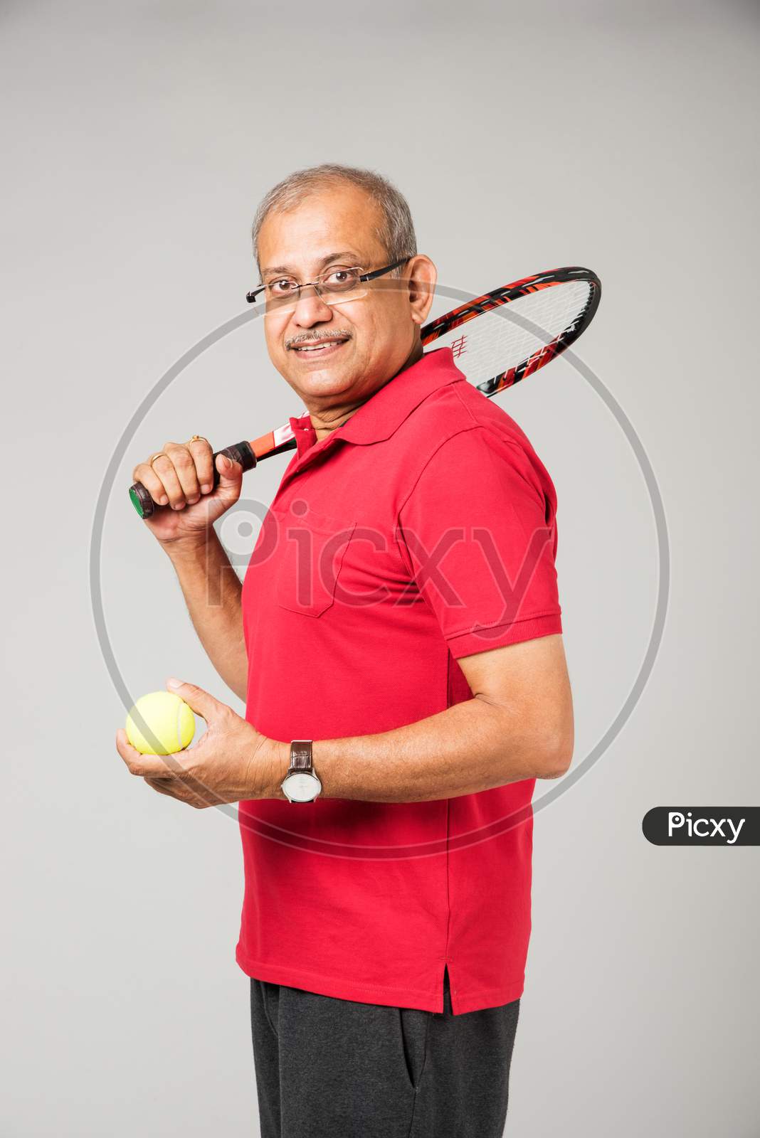 Senior indian man playing sports