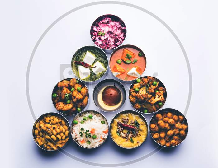 Assorted Indian Food in steel bowls