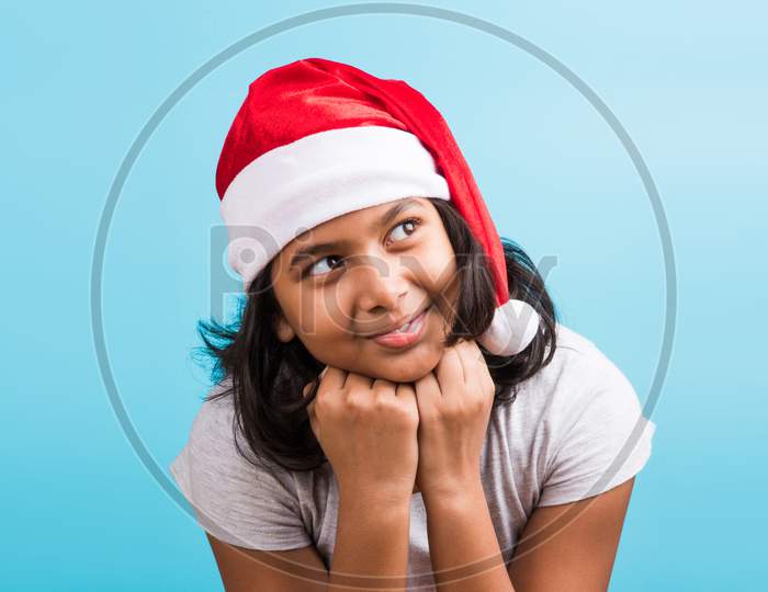 Indian small girl celebrating Christmas / X-mas
