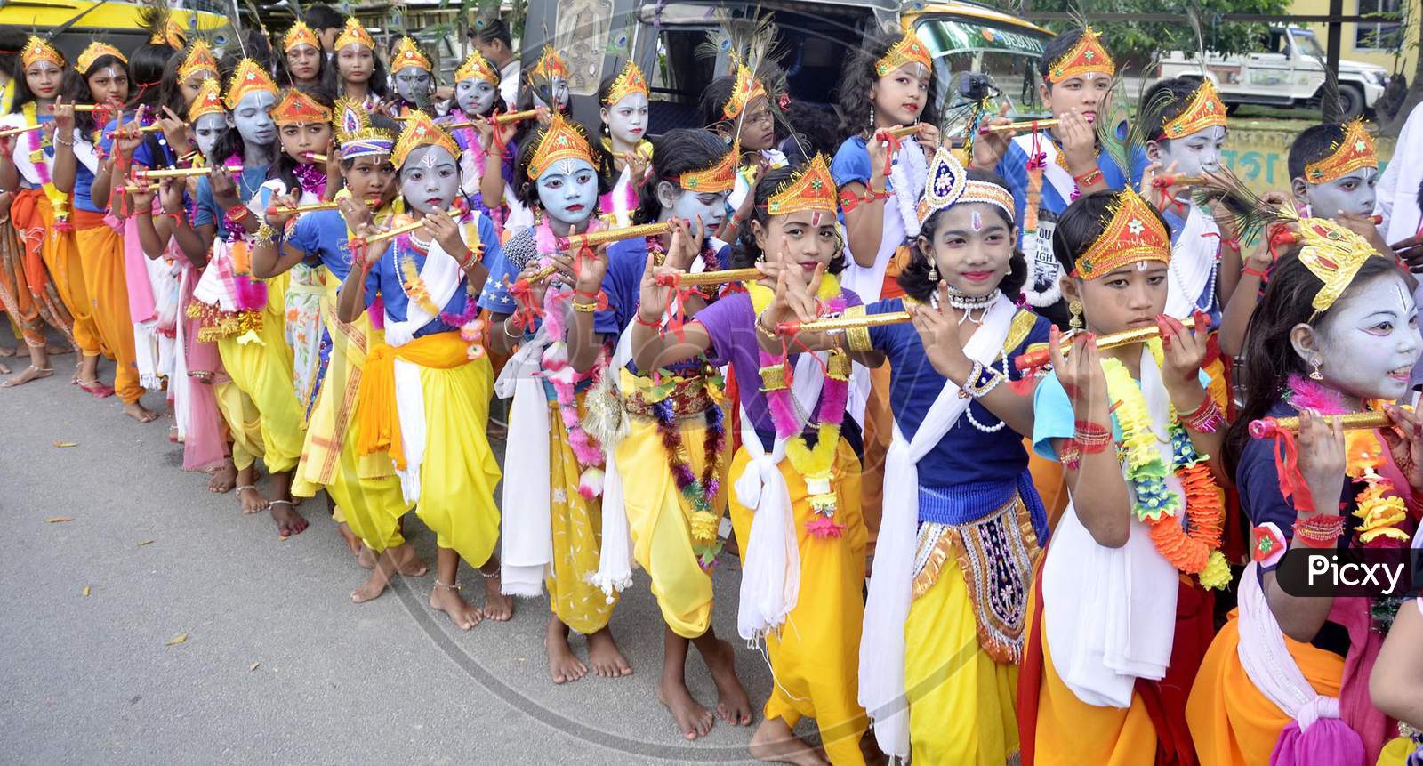 Children dress up as Lord Krishna on the occasion of Janmashtami festival