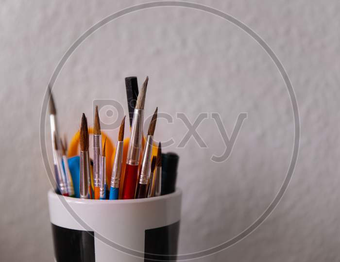Art brushes in a Mug
