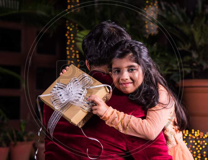 Indian father and daughter celebrating diwali festival