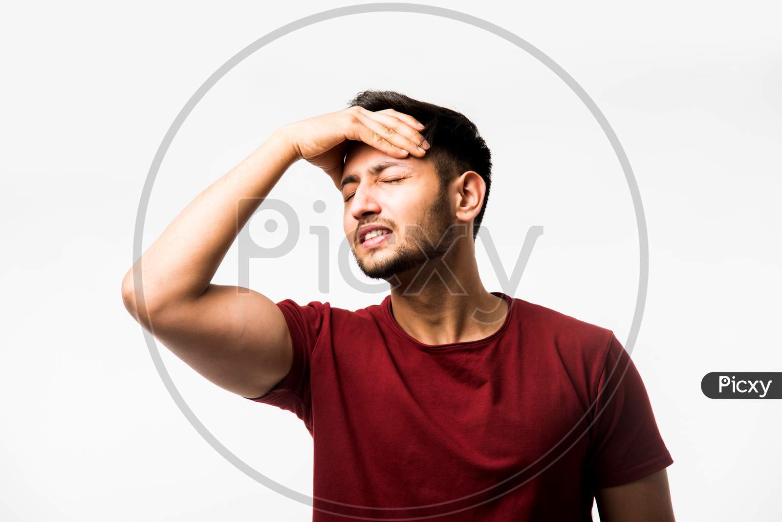 man suffering from head ache