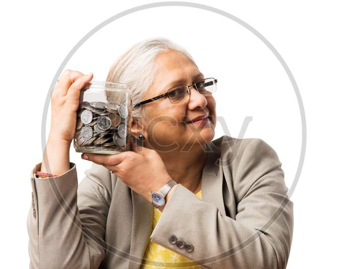 Senior woman with money/coins - saving concept