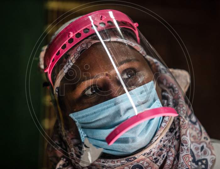 Health workers conduct a community survey in a containment zone in Nabi Karim, New Delhi on July 06, 2020