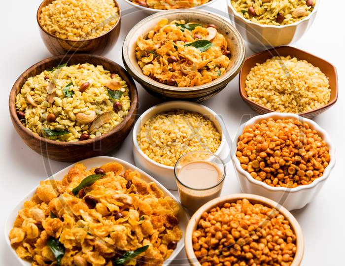 Group of Cornflake and Thick Poha Chivda or Chiwda and Chatpata Masala chana and fried crispy Moong Dal, served in a bowl. selec