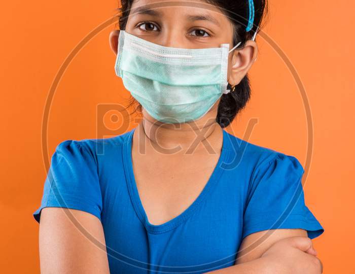 Small girl with medical health mask