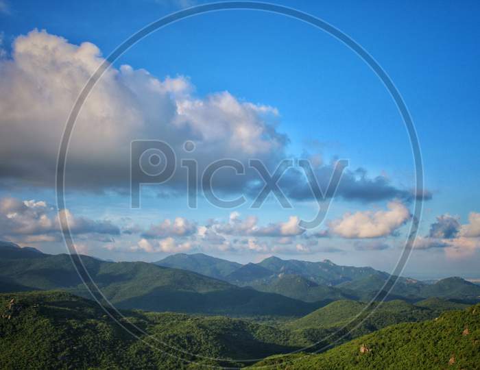 Mesmerising clouds and vast strech of green valleys