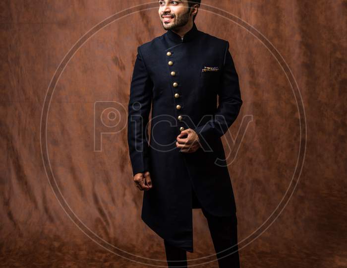 Male wears Coat / Sherwani, traditional Indian dress for wedding or festival