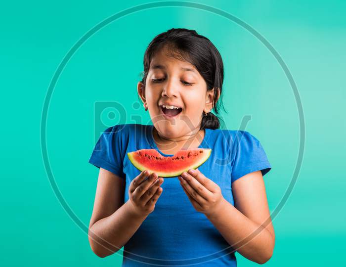 Small girl eating watermelon / tarbuj fruit