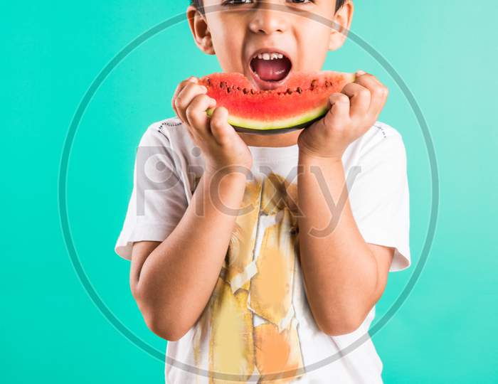 Small boy eating watermelon / tarbuj fruit