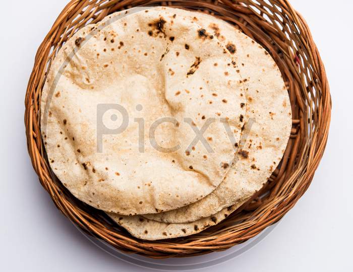 Image of Phulka Chapati (Roti) On Non Stick Tawa.Indian