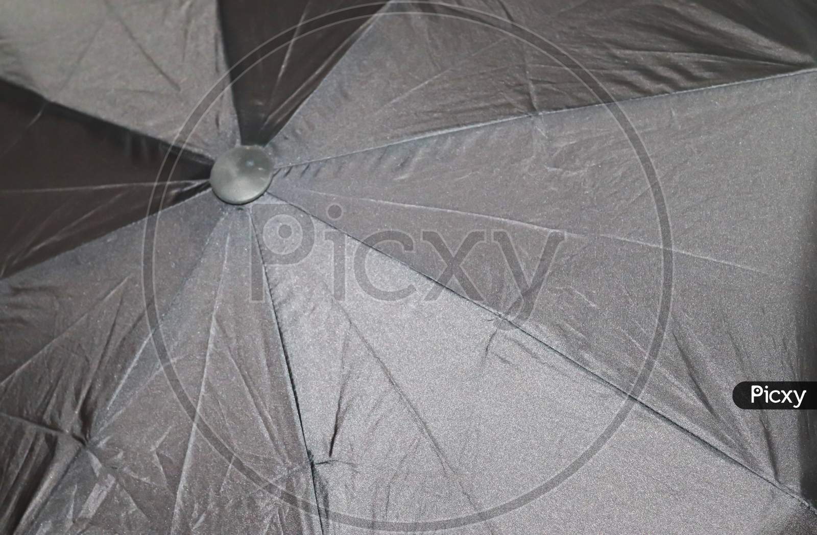 Close Up View At The Colorful Surfaces Of A Rainproof Umbrella