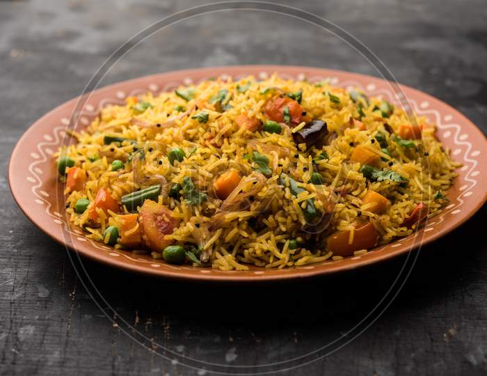 Tawa Pulao/Pulav/Pilaf/Pilau is an Indian Street Food  made using basmati rice, vegetables and spices. Selective focus