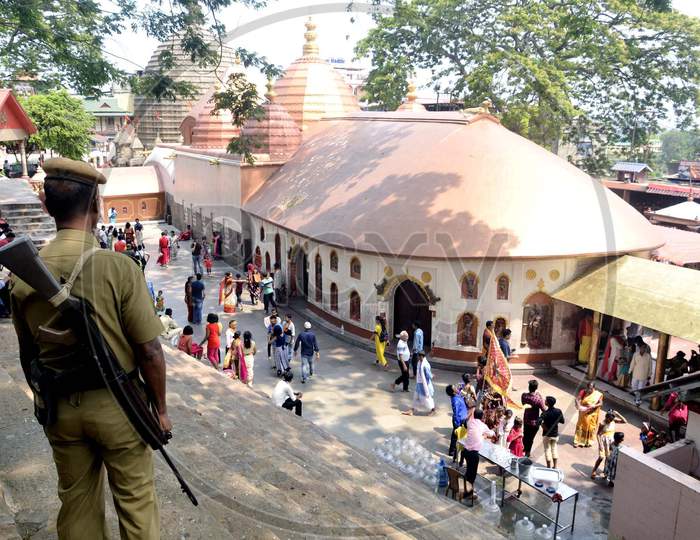 A Security person stand guard  the Kamakhya