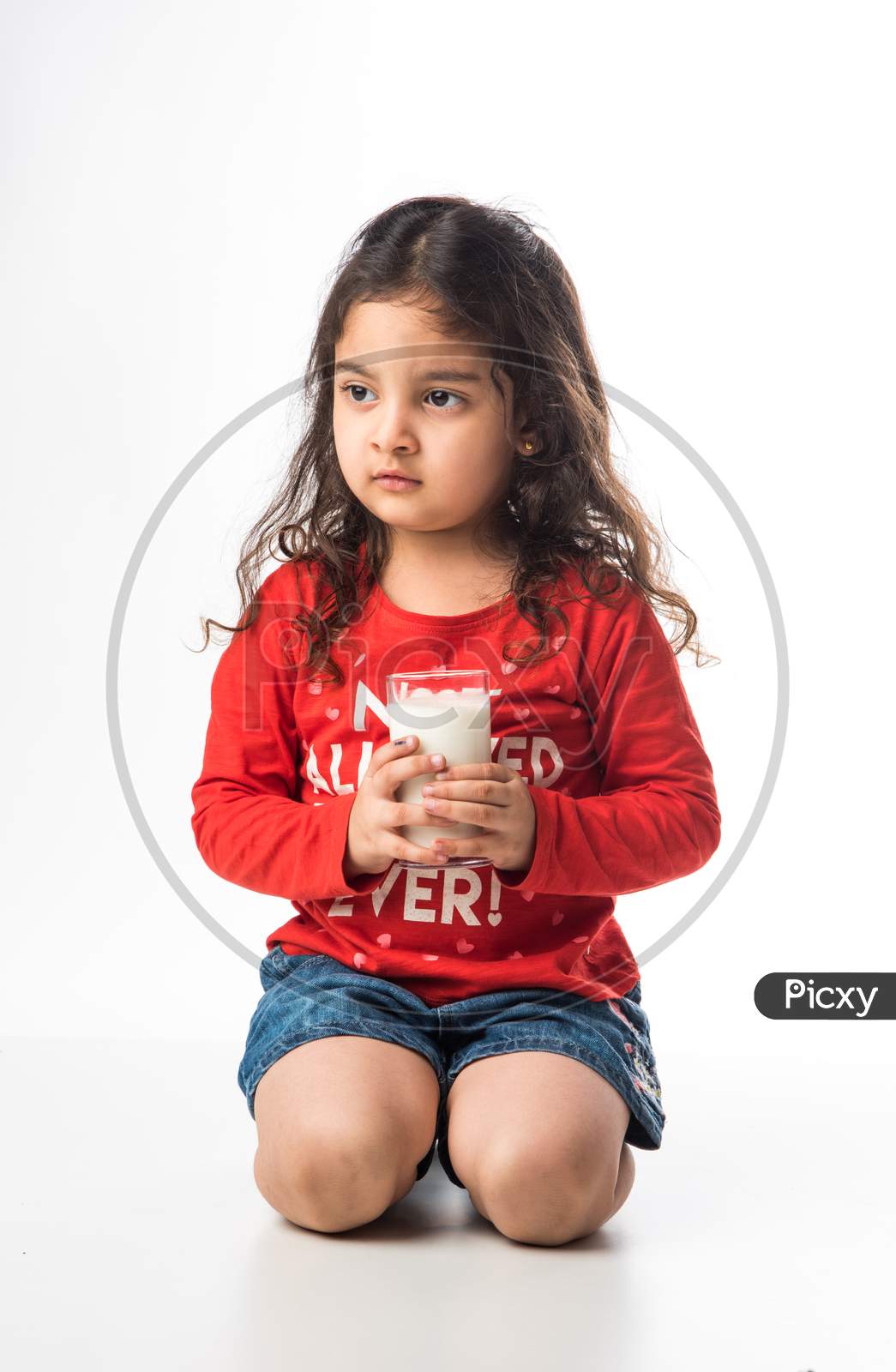 Little Girl drinking Milk