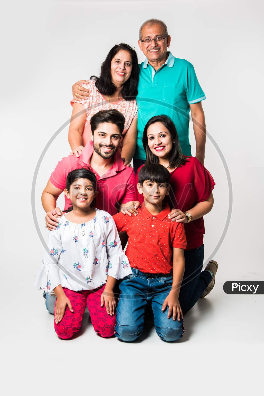 Indian family isolated over white background