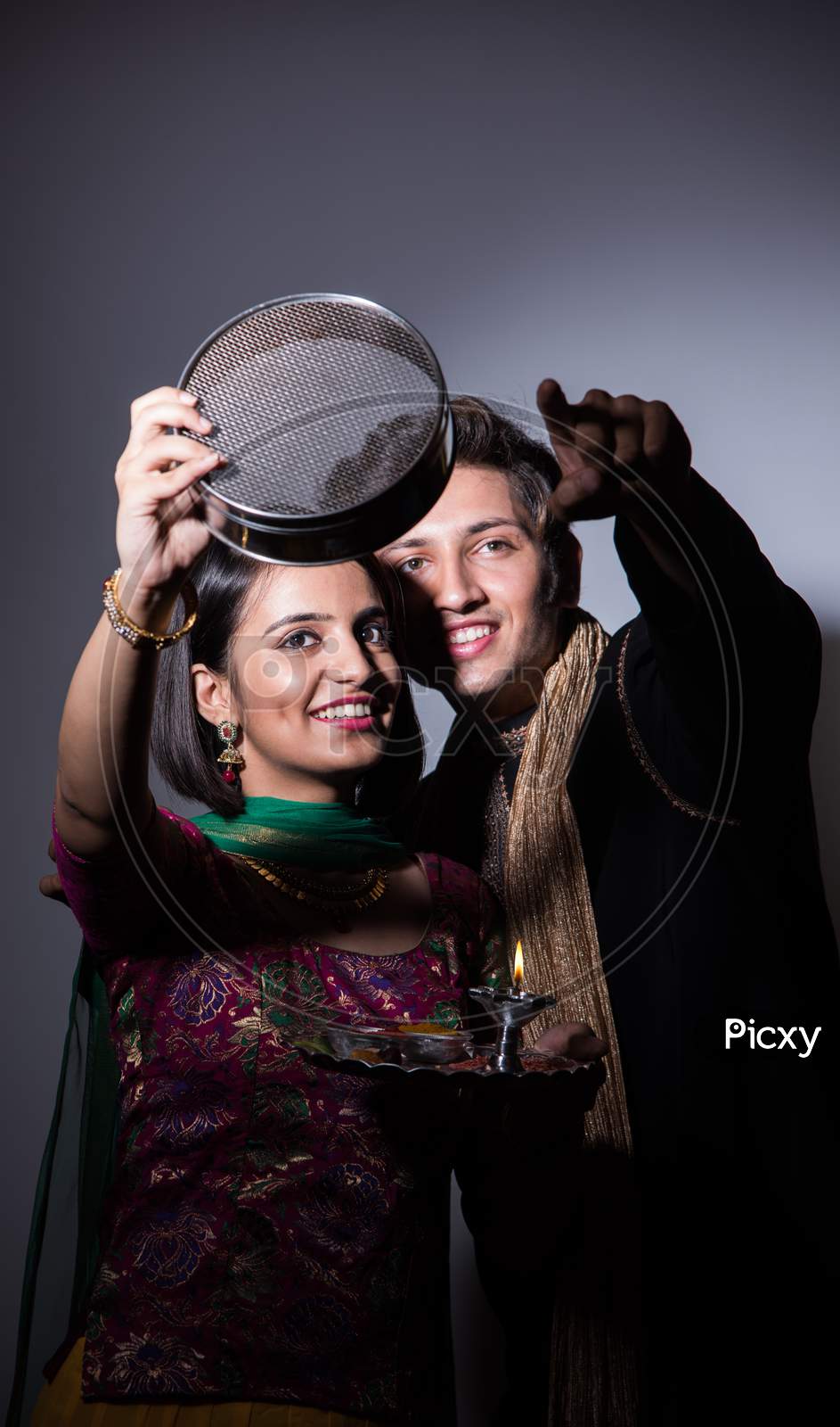 couple celebrating karwa chauth festival