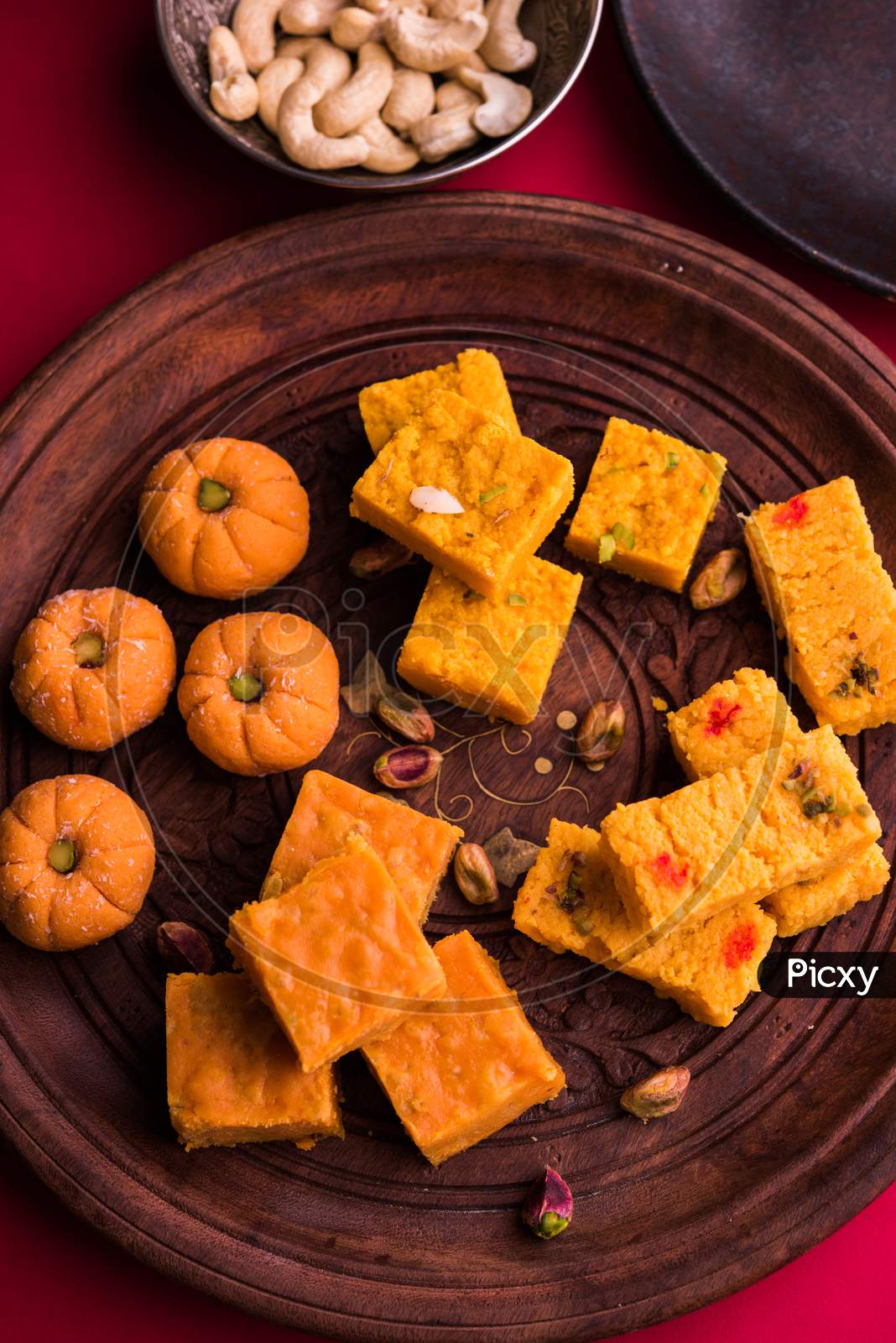 Diwali sweets pedha and burfi and mithai made from milk, dry fruits and fruits