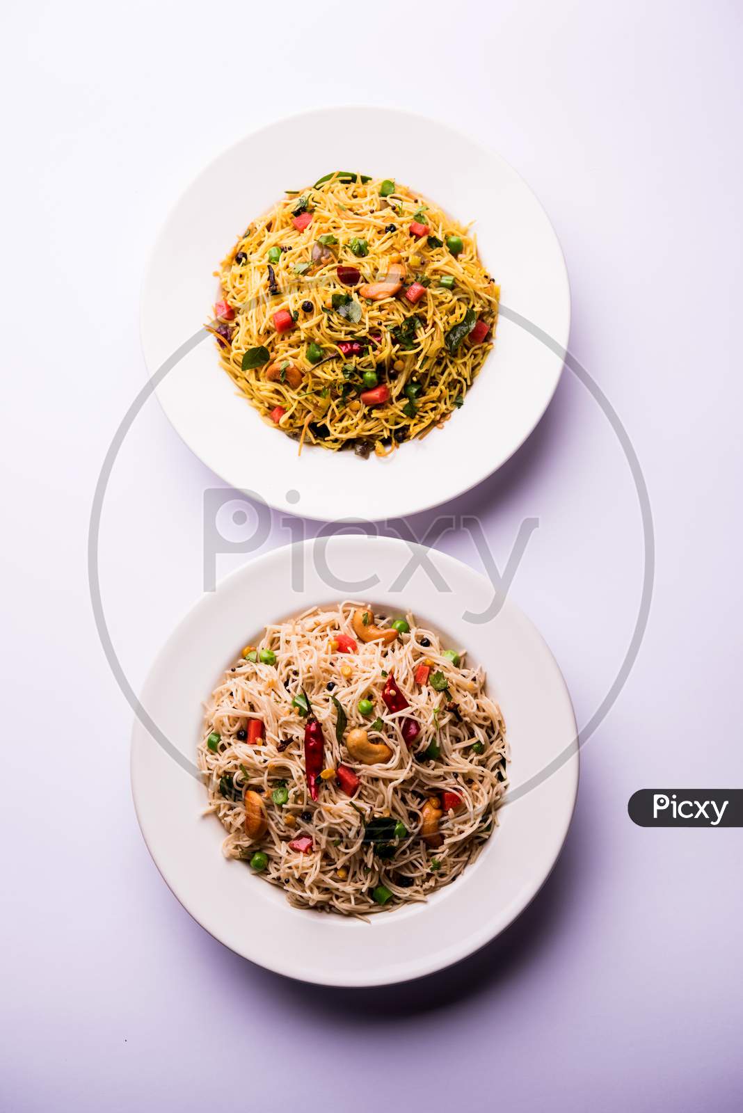 Spicy semiya uppma or upma served in plate. selective focus