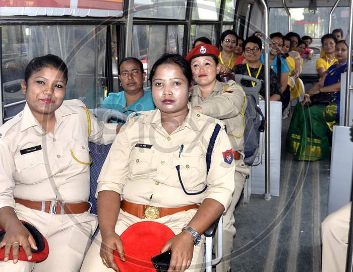 Women Police and  Polling officials sitting on Bus to leave their respective polling stations