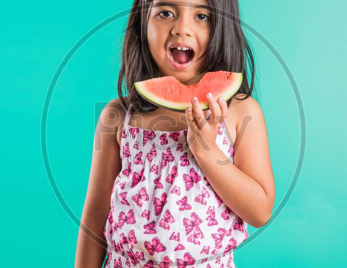 Small girl eating watermelon / tarbuj fruit