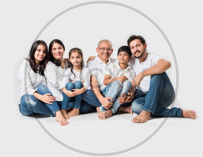 family of 6 sitting over white background