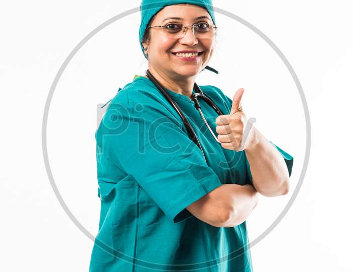 Indian Female surgeon/doctor in green dress and stethoscope