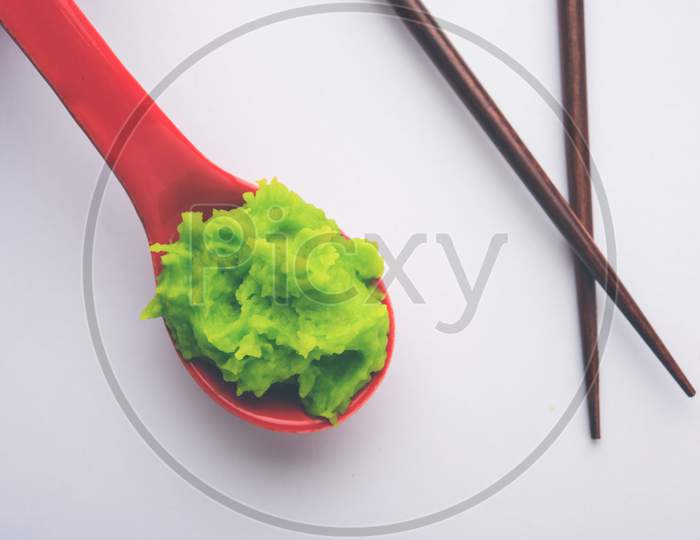 Green wasabi sauce or paste in bowl