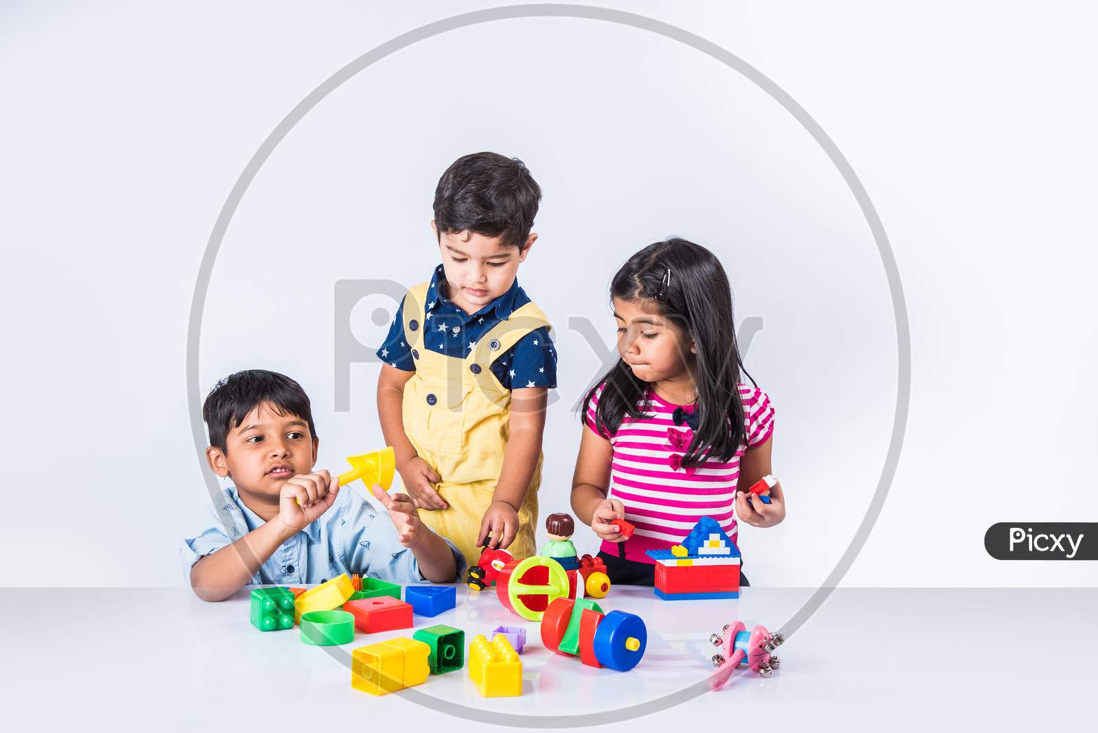 Kids playing with block toys
