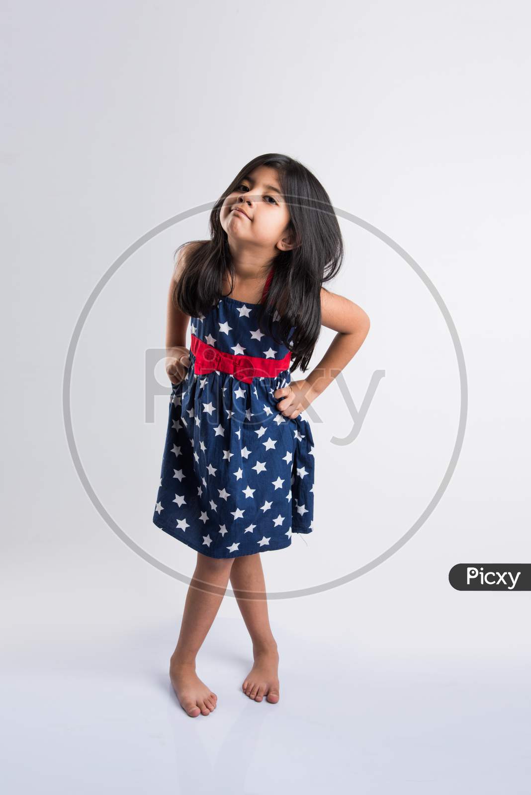 Indian cute girl over white background
