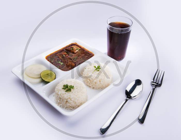 Fish curry with plain Rice