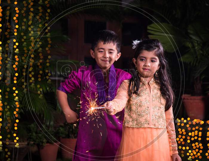 kids celebrating diwali or birthday