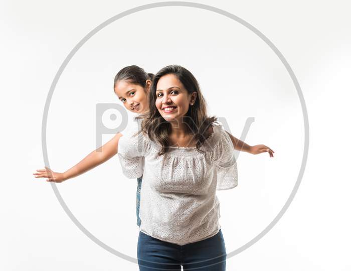 Indian mother and small daughter