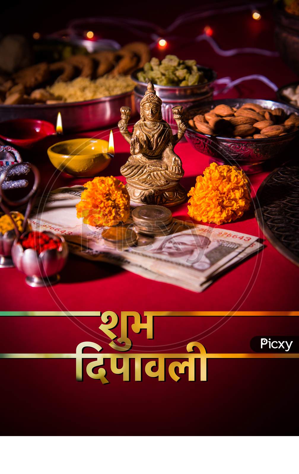 Happy Diwali greeting card showing Goddess Laxmi, sweets etc