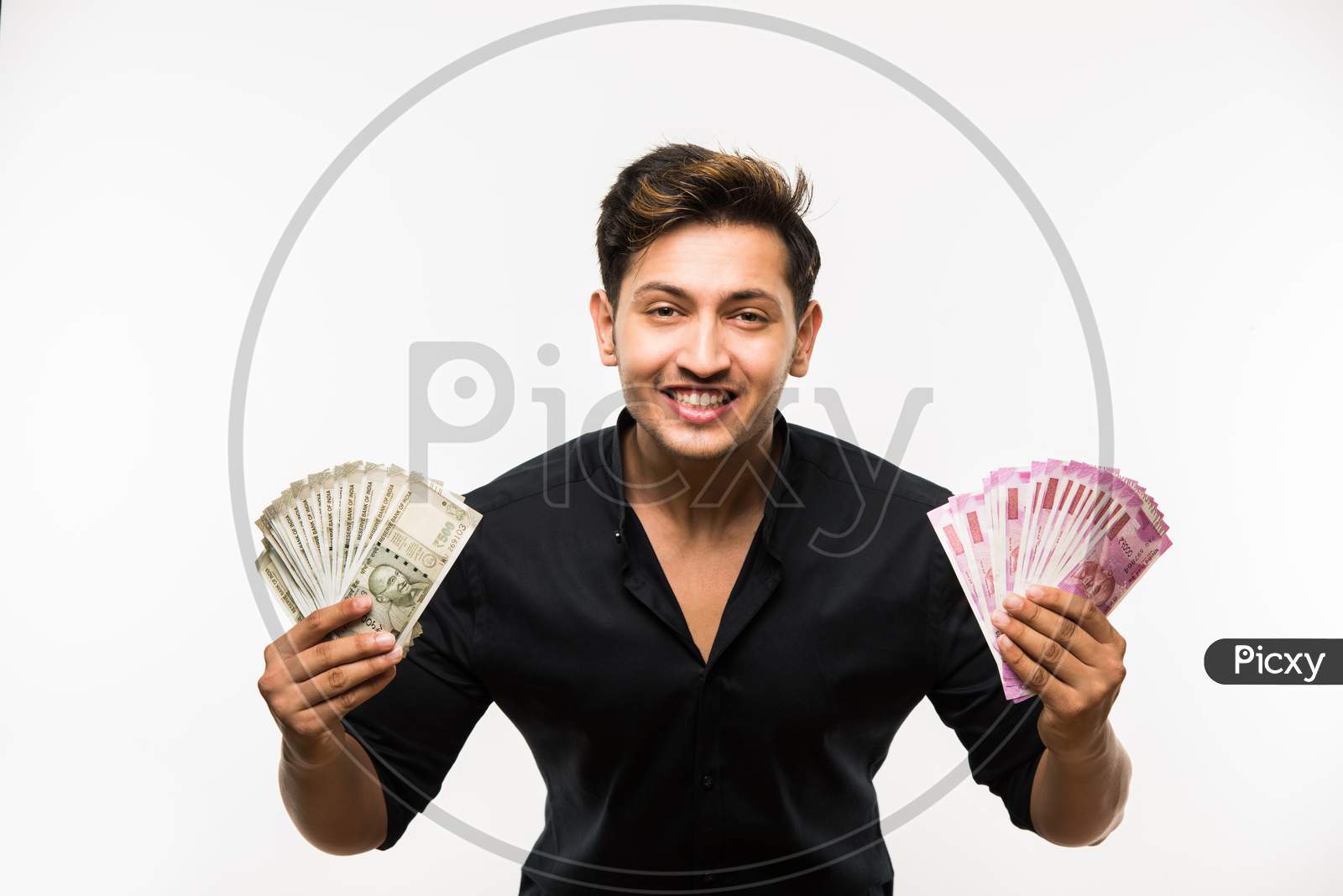 Young man holding cash / money fan / dollars