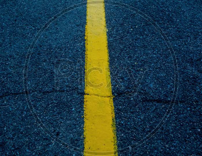 Yellow Border In The Middle Of The Road