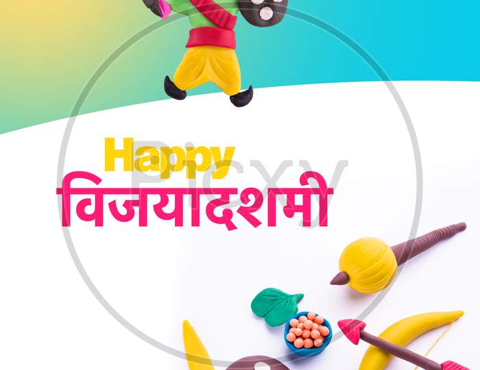 happy Dussehra / Ayudh Puja greeting card with Ravan made using colourful clay or dough