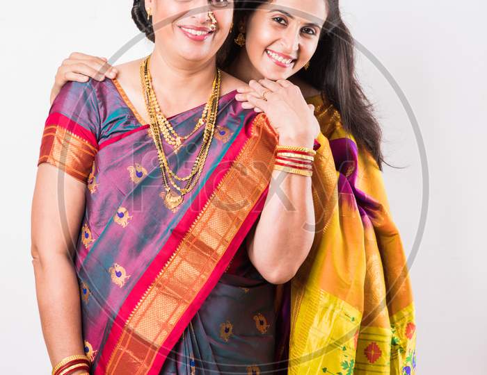 Indian Mother and young daughter in traditional wear