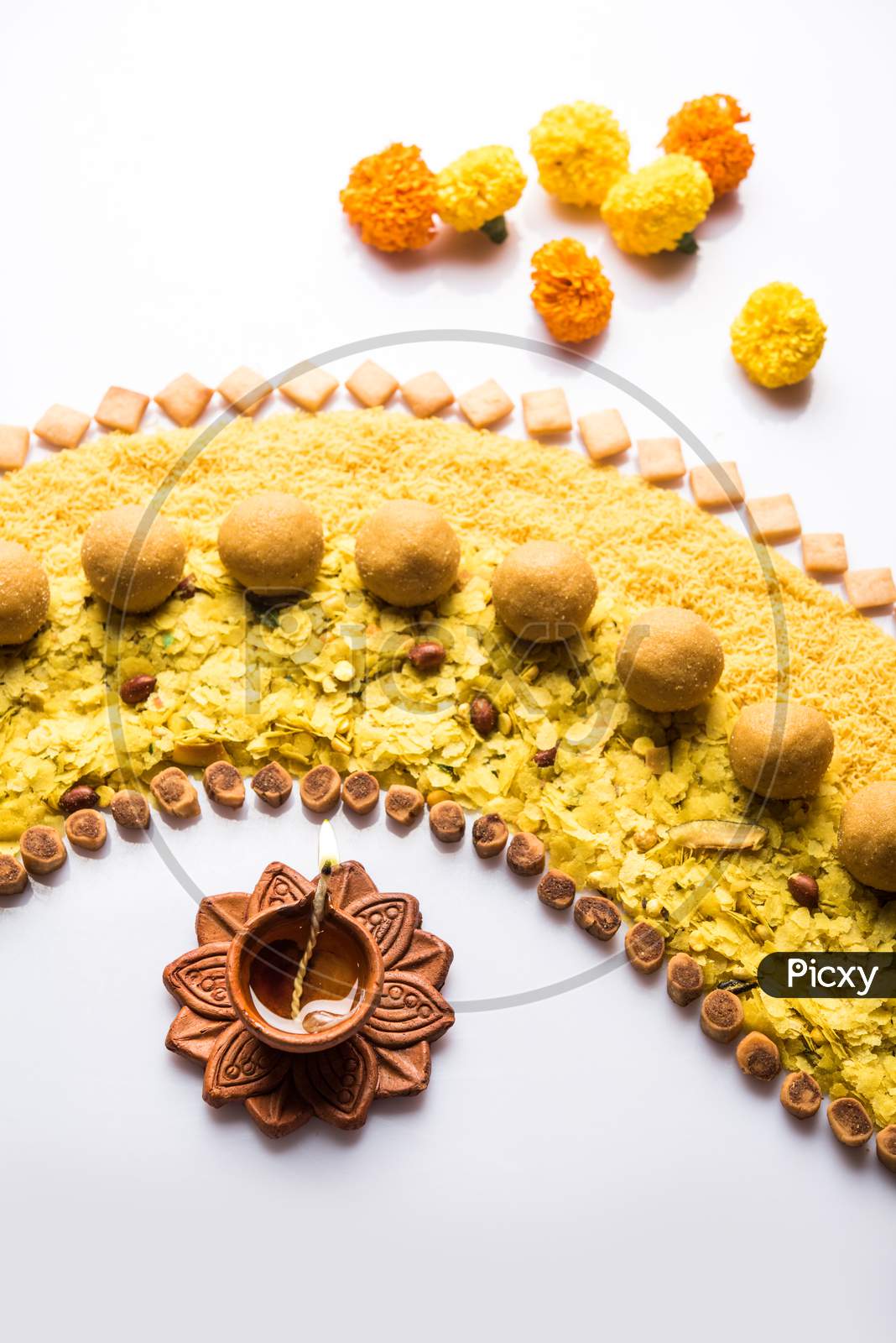 Design strip using diwali diya and food