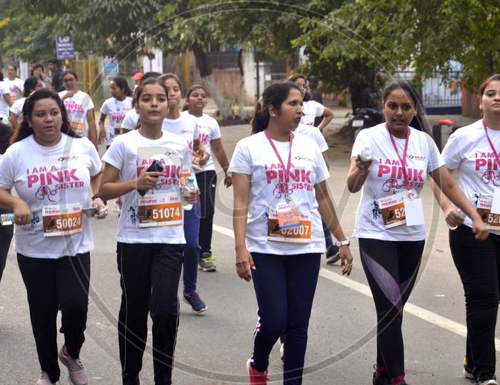 Participants run in the Pinkathon Guwahati 2019